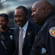 Ben Carson (center) speaks with police officers as he prepares to board his bus after a stop to sign his book at a Barnes and Noble store in Fort Lauderdale, Fla., Nov. 5, 2015. Carson is leading the field in some of the recent polling for the Republican presidential-nomination contest.
Joe Raedle/Getty Images